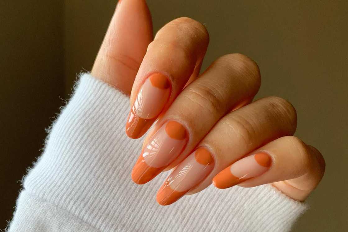 Orange half-moon nails Orange half-moon nails