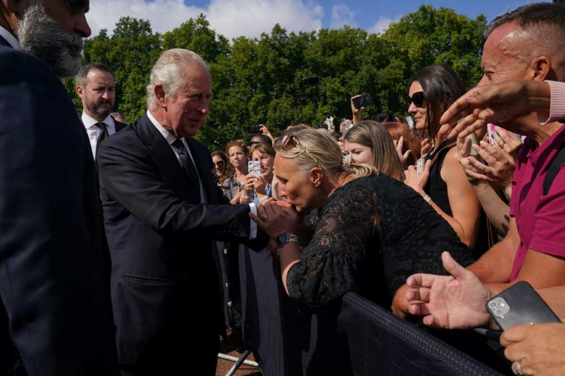 Crowds outside Buckingham Palace shouted "God Save the King" as he greeted them Crowds outside Buckingham Palace shouted "God Save the King" as he greeted them
