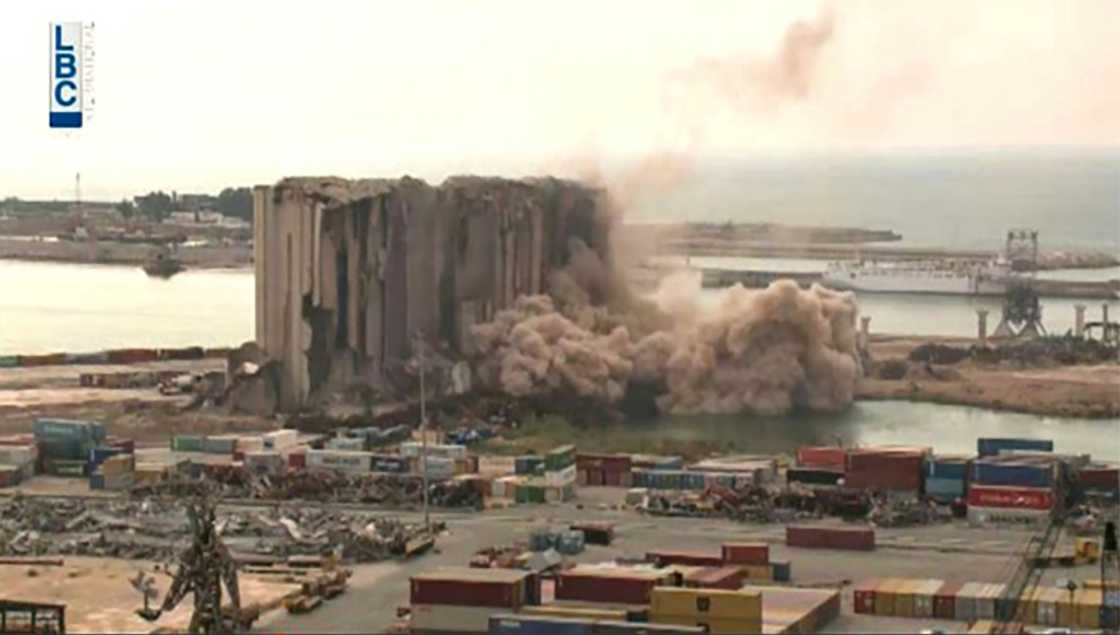 Parts of Beirut's blast-damaged grain silos collapsed on July 31, 2022, as seen in this screen grab of Lebanese Broadcasting Corp International footage