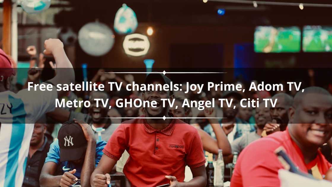 A crowd cheering as they watch a football match on TV A crowd cheering as they watch a football match on TV