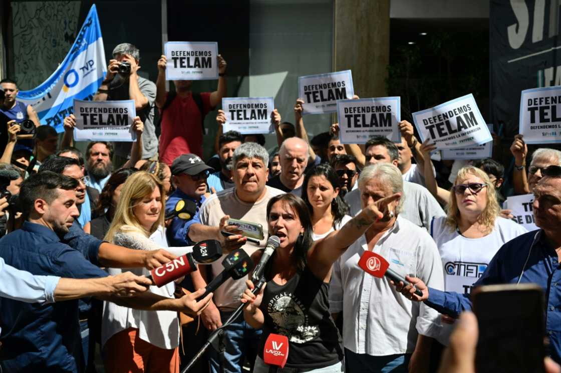 Hundreds of people protested the closure outside the Telam headquarters in central Buenos Aires Hundreds of people protested the closure outside the Telam headquarters in central Buenos Aires