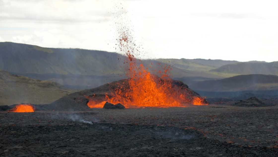 The lava fountains spurt as high as 70 meters (230 feet) The lava fountains spurt as high as 70 meters (230 feet)