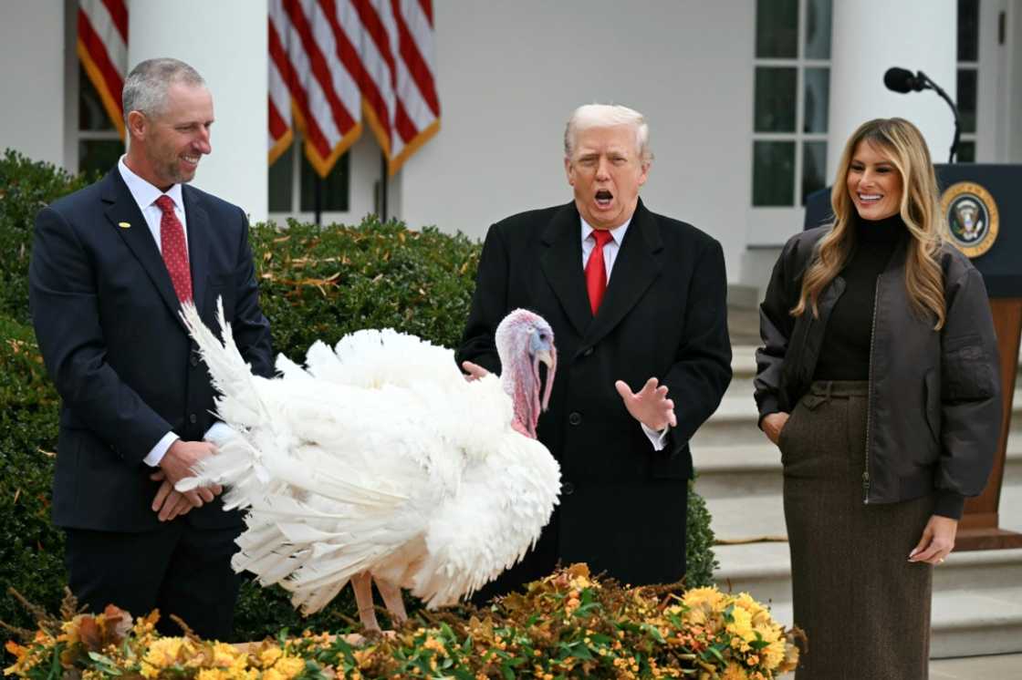 First Lady Melania Trump looks on as US President Donald Trump pardons Gobble, one of the National Thanksgiving turkeys, during the White House turkey pardon ceremony in the Rose Garden of the White House in Washington, DC First Lady Melania Trump looks on as US President Donald Trump pardons Gobble, one of the National Thanksgiving turkeys, during the White House turkey pardon ceremony in the Rose Garden of the White House in Washington, DC