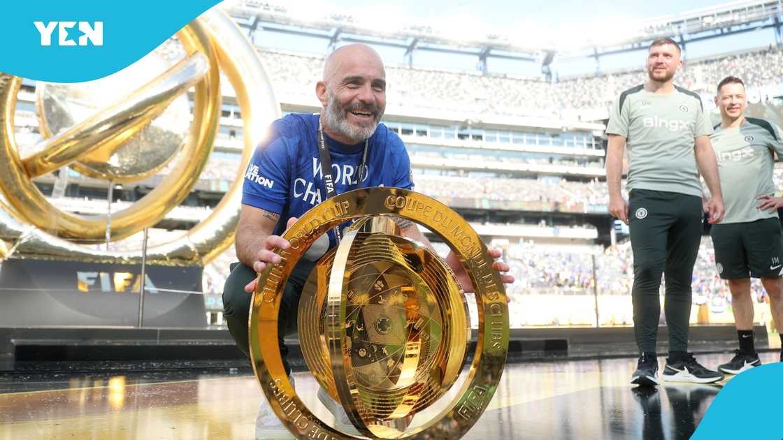 Chelsea, head coach, Enzo Maresca, FIFA Club World Cup trophy. Chelsea, head coach, Enzo Maresca, FIFA Club World Cup trophy.