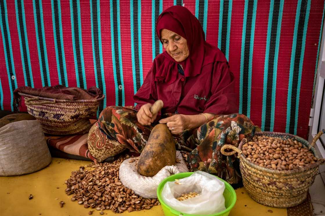 Shelling argan nuts to make oil is part of a time-honoured and labour-intensive craft Shelling argan nuts to make oil is part of a time-honoured and labour-intensive craft