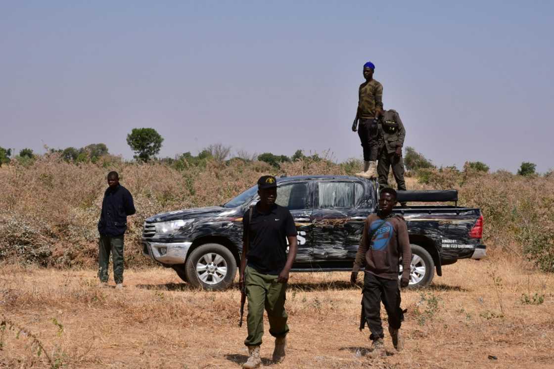 Nigerian security forces seen on the site of a sabotage attack allegedly perpetrated by Boko Haram on the outskirts of Maiduguri on February 12, 2021. Nigerian security forces seen on the site of a sabotage attack allegedly perpetrated by Boko Haram on the outskirts of Maiduguri on February 12, 2021.
