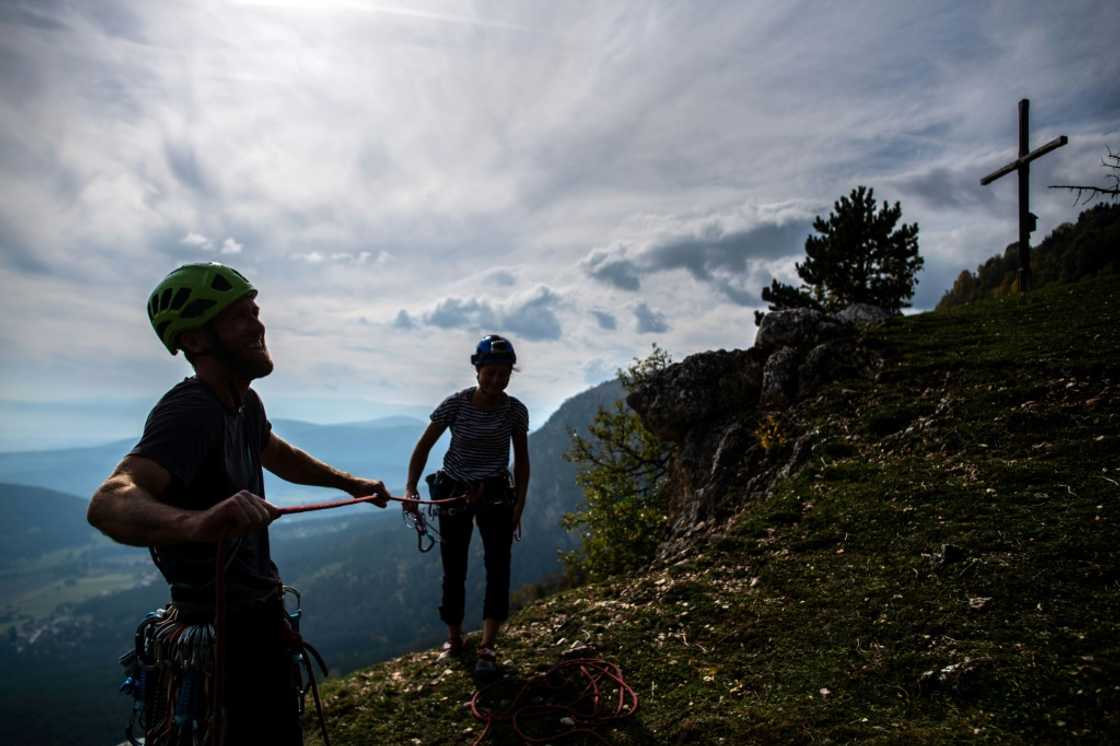 Climbers Daniel Kufner (left) and Joanna Geschev at the top of an Austrian route baptised 'Fortress Europe' Climbers Daniel Kufner (left) and Joanna Geschev at the top of an Austrian route baptised 'Fortress Europe'