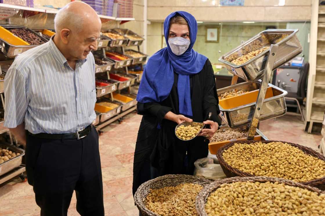 Iranian pistachio wholesaler Abbas Emami and his daughter Marjan