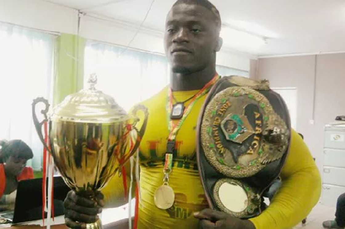 Ghana’s ‘Most Strongest’ man wanted in connection to shooting at NDC Kumasi office