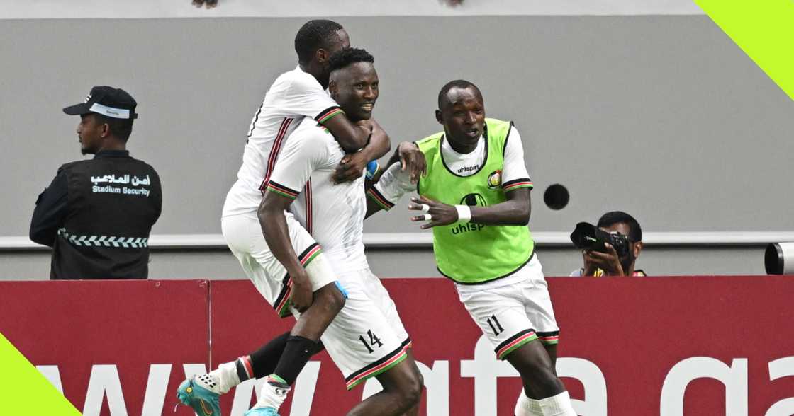 Kenyan players celebrate a goal against Qatar Kenyan players celebrate a goal against Qatar