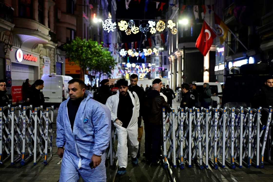 Turkish policemen secure the area after a blast in Istanbul Turkish policemen secure the area after a blast in Istanbul