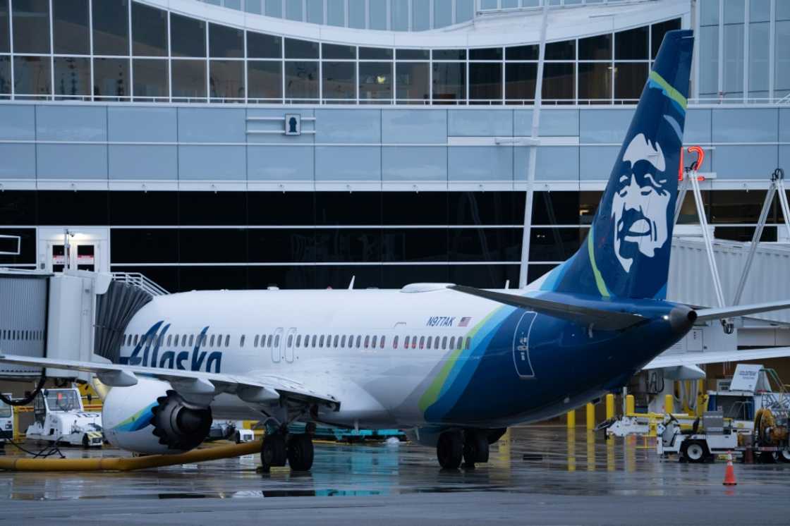 An Alaska Airlines Boeing 737 MAX 9 plane sits at a gate at Seattle-Tacoma International Airport in Seattle, Washington