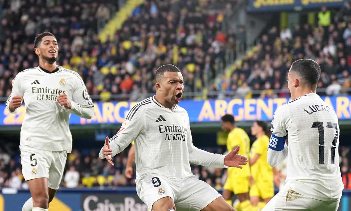 Kylian Mbappe scores and celebrates with Real Madrid teammate Lucas Vazquez againstVillarreal CF at Estadio de la Ceramica on March 15, 2025 in Villarreal, Spain Kylian Mbappe scores and celebrates with Real Madrid teammate Lucas Vazquez againstVillarreal CF at Estadio de la Ceramica on March 15, 2025 in Villarreal, Spain