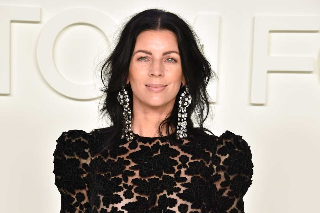Liberty Ross poses against a white background in Los Angeles, California Liberty Ross poses against a white background in Los Angeles, California