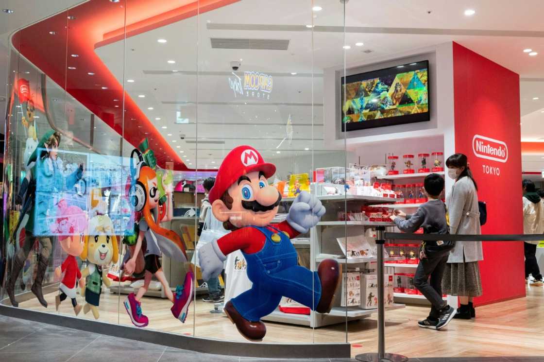 Nintendo has raised its profit forecast on a weak yen and strong games sales Nintendo has raised its profit forecast on a weak yen and strong games sales