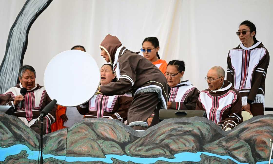 Indigenous residents sing as they await the arrival of Pope Francis in Iqaluit, Nunavut, Canada, on July 29, 2022