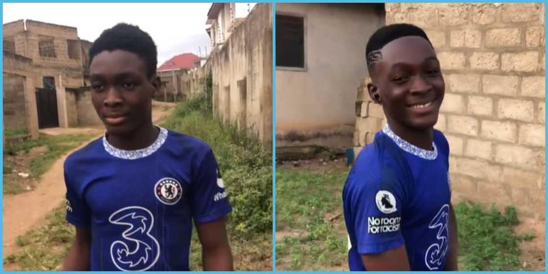 A young boy smiles after a kind Ghanaian barber gives him a free haircut.