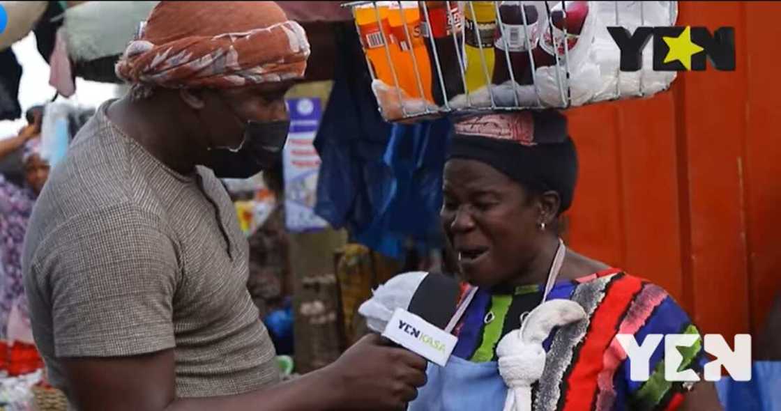 Ghanaian man woman speaking in an interview Ghanaian man woman speaking in an interview