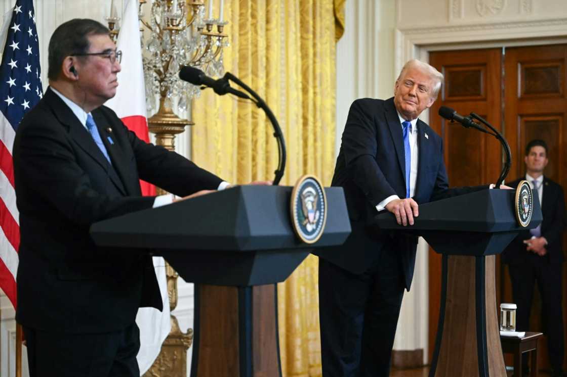 US President Donald Trump (R) looks on as Japanese Prime Minister Shigeru Ishiba speaks during a joint press conference in the East Room of the White House in Washington, DC, on February 7, 2025. US President Donald Trump (R) looks on as Japanese Prime Minister Shigeru Ishiba speaks during a joint press conference in the East Room of the White House in Washington, DC, on February 7, 2025.