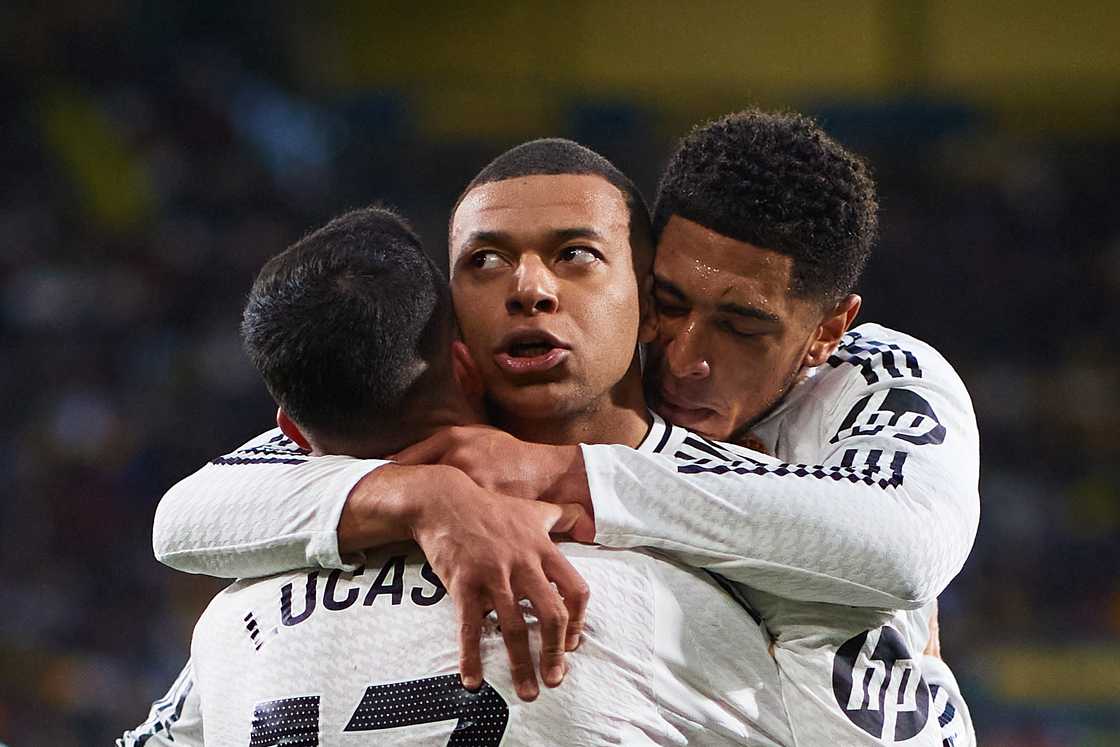 Kylian Mbappe of Real Madrid celebrates after scoring the team's second goal with his teammates in the LaLiga EA Sports match between Villarreal CF and Real Madrid at Estadio de la Ceramica in Vila-real, Spain, on March 15, 2025 Kylian Mbappe of Real Madrid celebrates after scoring the team's second goal with his teammates in the LaLiga EA Sports match between Villarreal CF and Real Madrid at Estadio de la Ceramica in Vila-real, Spain, on March 15, 2025