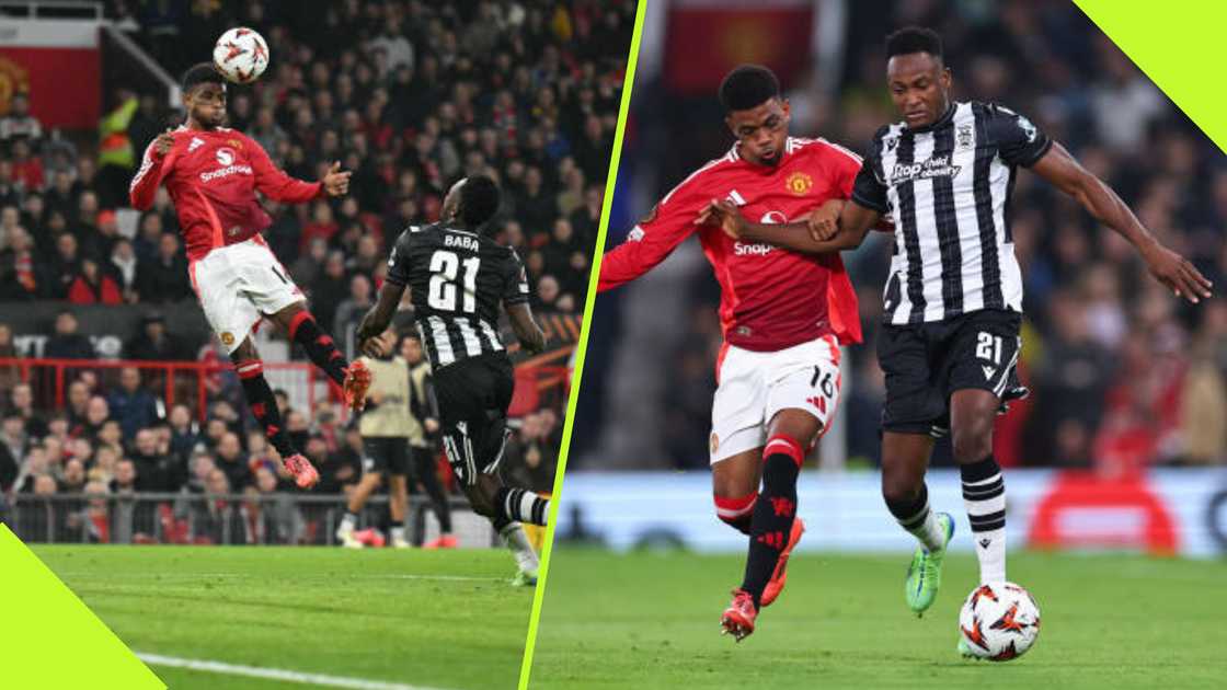 Baba Rahman struggles against Amad Diallo at Old Trafford. Baba Rahman struggles against Amad Diallo at Old Trafford.