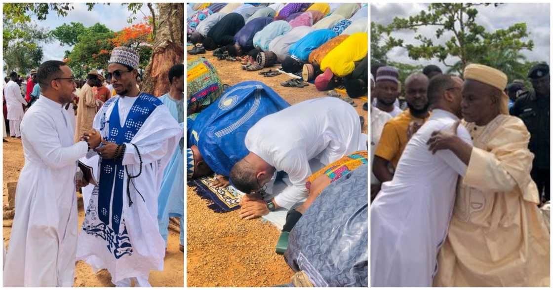 Photo of Ghanaian Catholic Priest praying with Muslims