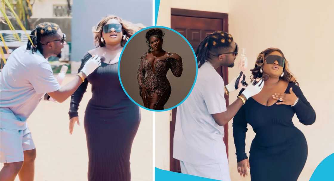 Amerado applies makeup on Sista Afia's cleavage Amerado applies makeup on Sista Afia's cleavage