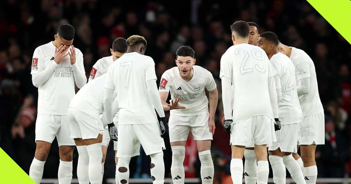 Arsenal players wearing special kit.