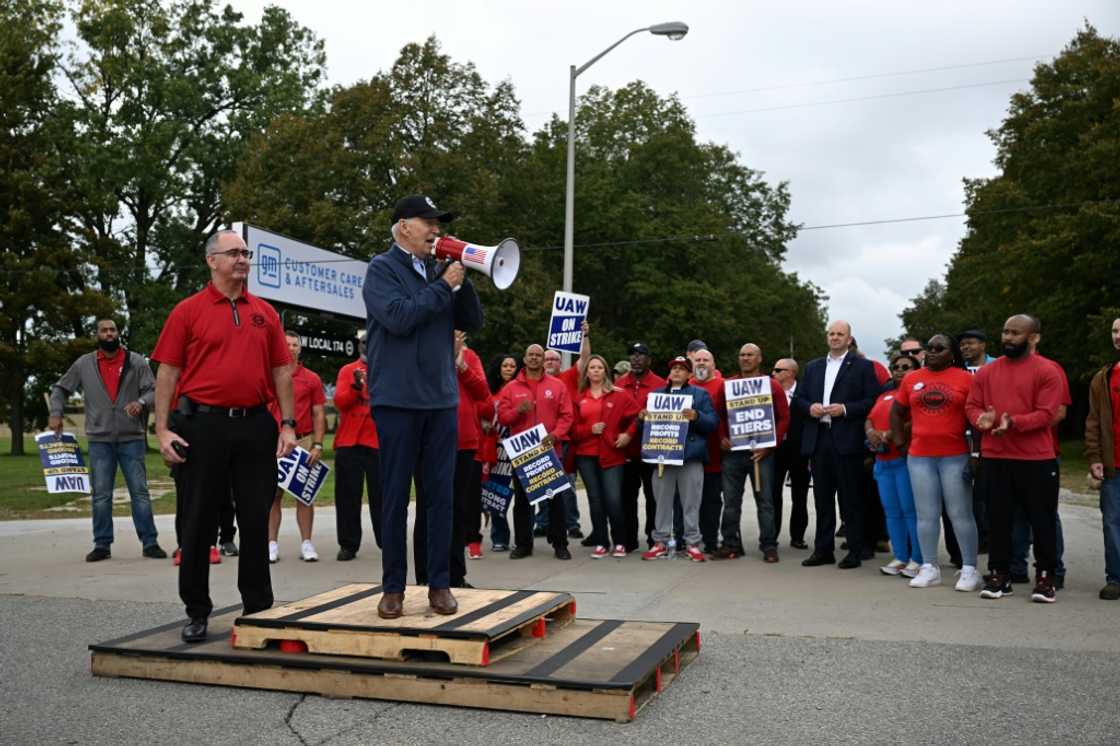 Biden addressed striking auto workers on the picket line through a bullhorn on Tuesday Biden addressed striking auto workers on the picket line through a bullhorn on Tuesday