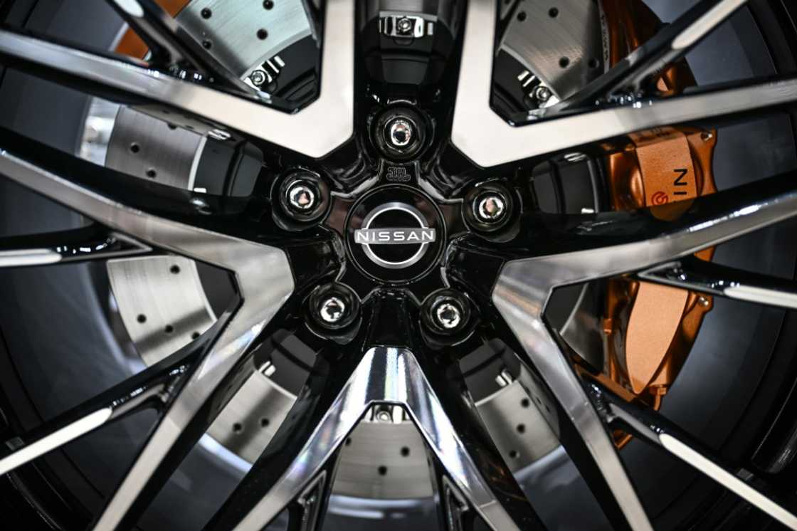 Shares in Japanese car giant Nissan surged more than 20 percent on reports it is in merger talks with Honda Shares in Japanese car giant Nissan surged more than 20 percent on reports it is in merger talks with Honda