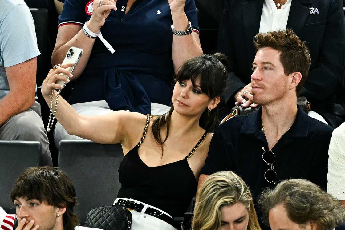 Nina Dobrev and skateboarder Shaun White take a selfie during the artistic gymnastics women's qualification