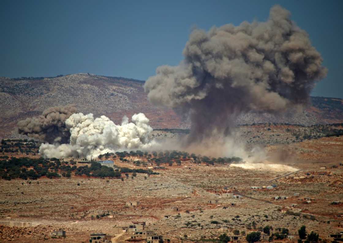 Plumes of smoke rise during a reported Russian bombing in Syria near the village of Hafsarja, in the rebel-held Idlib region, on September 8, 2022 Plumes of smoke rise during a reported Russian bombing in Syria near the village of Hafsarja, in the rebel-held Idlib region, on September 8, 2022