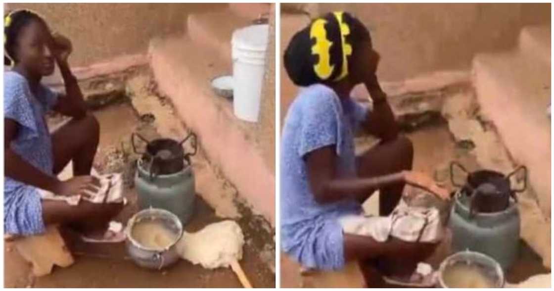A woman looking sad after earth tremor causes food to pour A woman looking sad after earth tremor causes food to pour