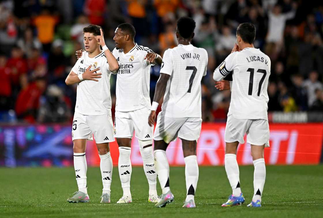 Arda Gueler of Real Madrid celebrates scoring his team's first goal with teammate David Alaba during the LaLiga match between Getafe CF and Real Madrid CF at Coliseum Alfonso Perez on April 23, 2025 in Getafe, Spain Arda Gueler of Real Madrid celebrates scoring his team's first goal with teammate David Alaba during the LaLiga match between Getafe CF and Real Madrid CF at Coliseum Alfonso Perez on April 23, 2025 in Getafe, Spain