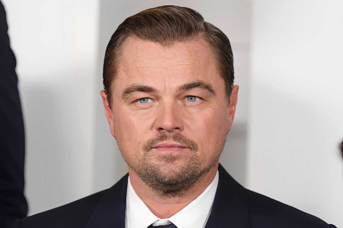 A man with a slicked-back blonde hairstyle A man with a slicked-back blonde hairstyle