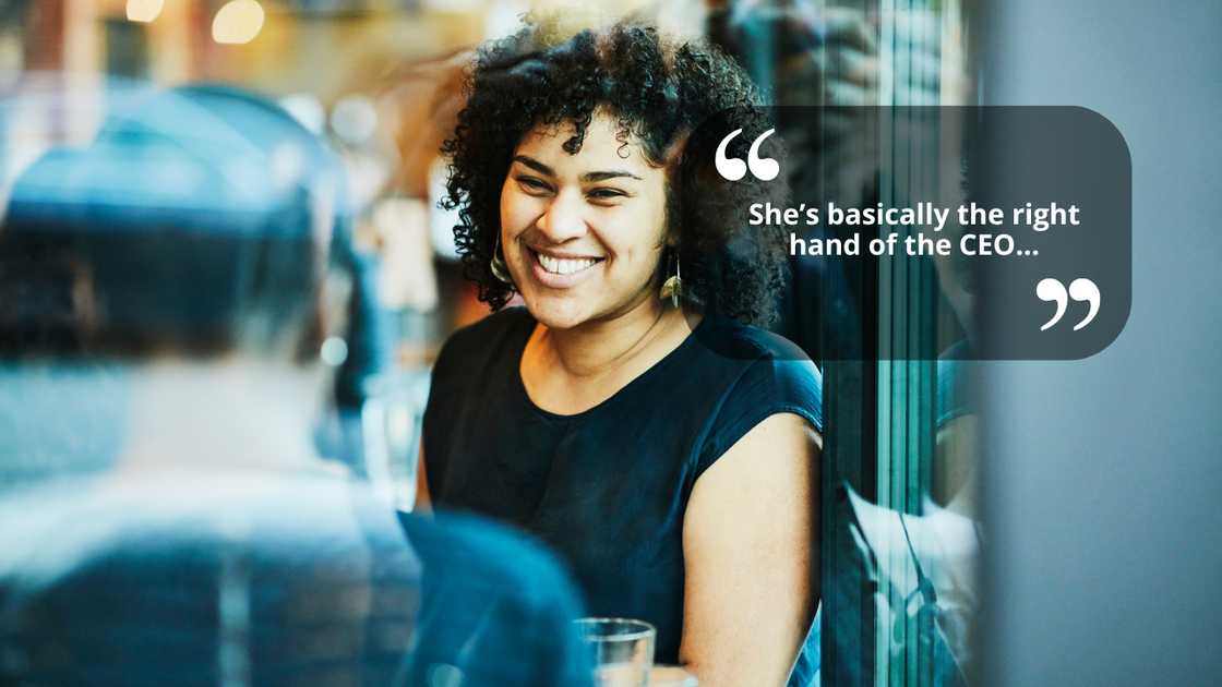 A woman laughing during a conversation A woman laughing during a conversation