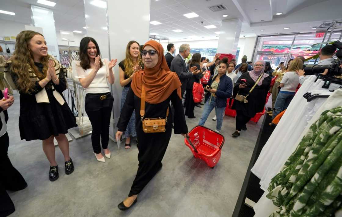 Bargain hunters streamed into the Century21  flagship department store in New York after the iconic discount hub reopened to much fanfare