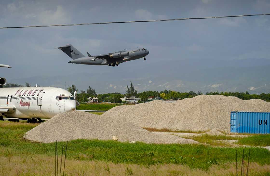 A Canadian military plane takes off from Haiti's capital Port-au-Prince, a visible sign of the security aid that Canada is providing as Haiti faces a rise in gang violence A Canadian military plane takes off from Haiti's capital Port-au-Prince, a visible sign of the security aid that Canada is providing as Haiti faces a rise in gang violence