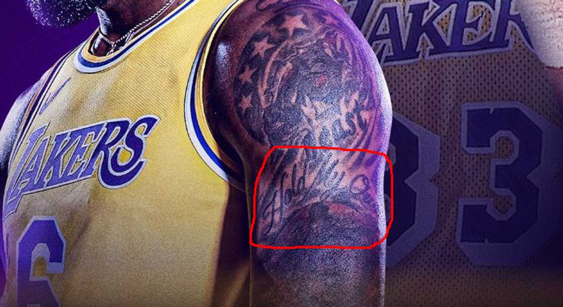 LeBron James' "Hold My Own" tattoo is placed on his upper left arm LeBron James' "Hold My Own" tattoo is placed on his upper left arm