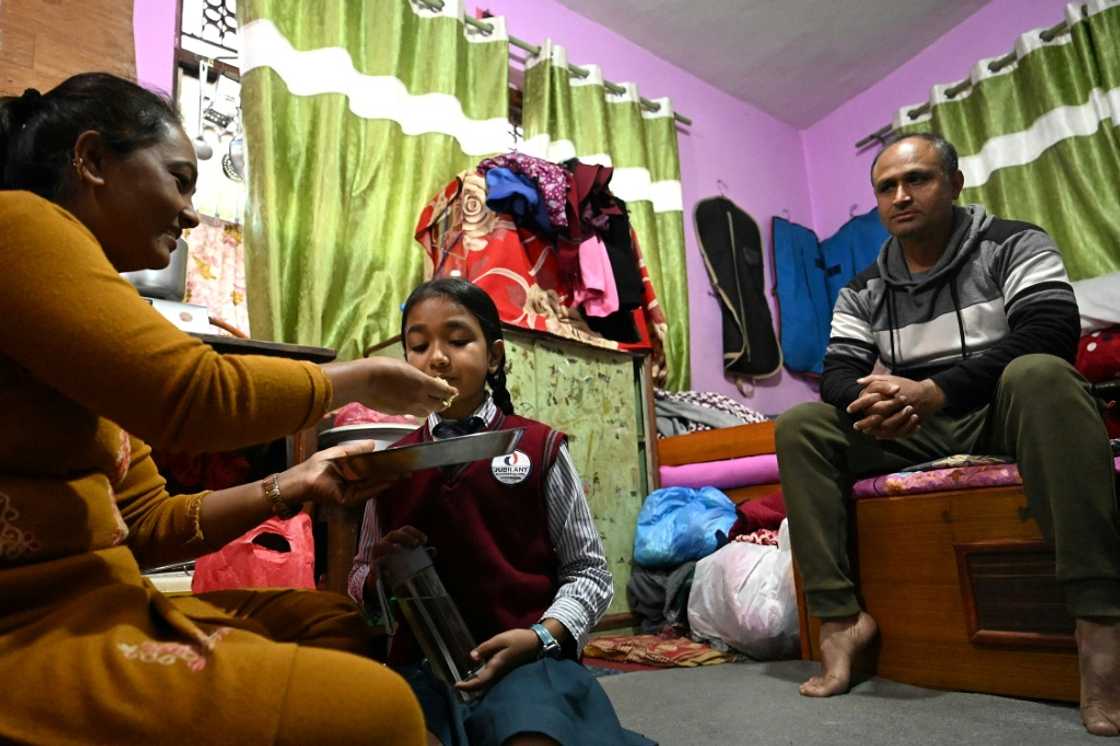 Kamal Gautam, who lost his hotel job when it was closed after being looted by rioters, told AFP he now has 'no idea how to support my family'