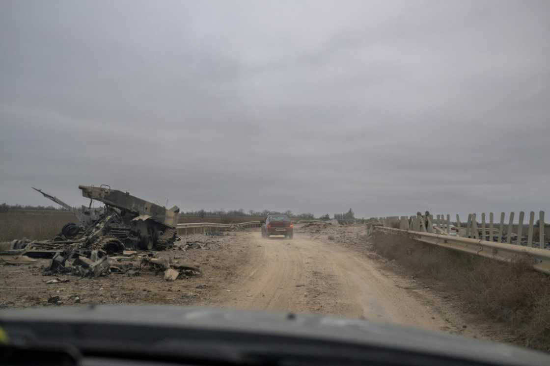 The main road into Kherson is littered with the wreckage of huge battles The main road into Kherson is littered with the wreckage of huge battles