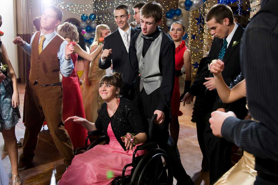 A disabled girl in a pink dress A disabled girl in a pink dress