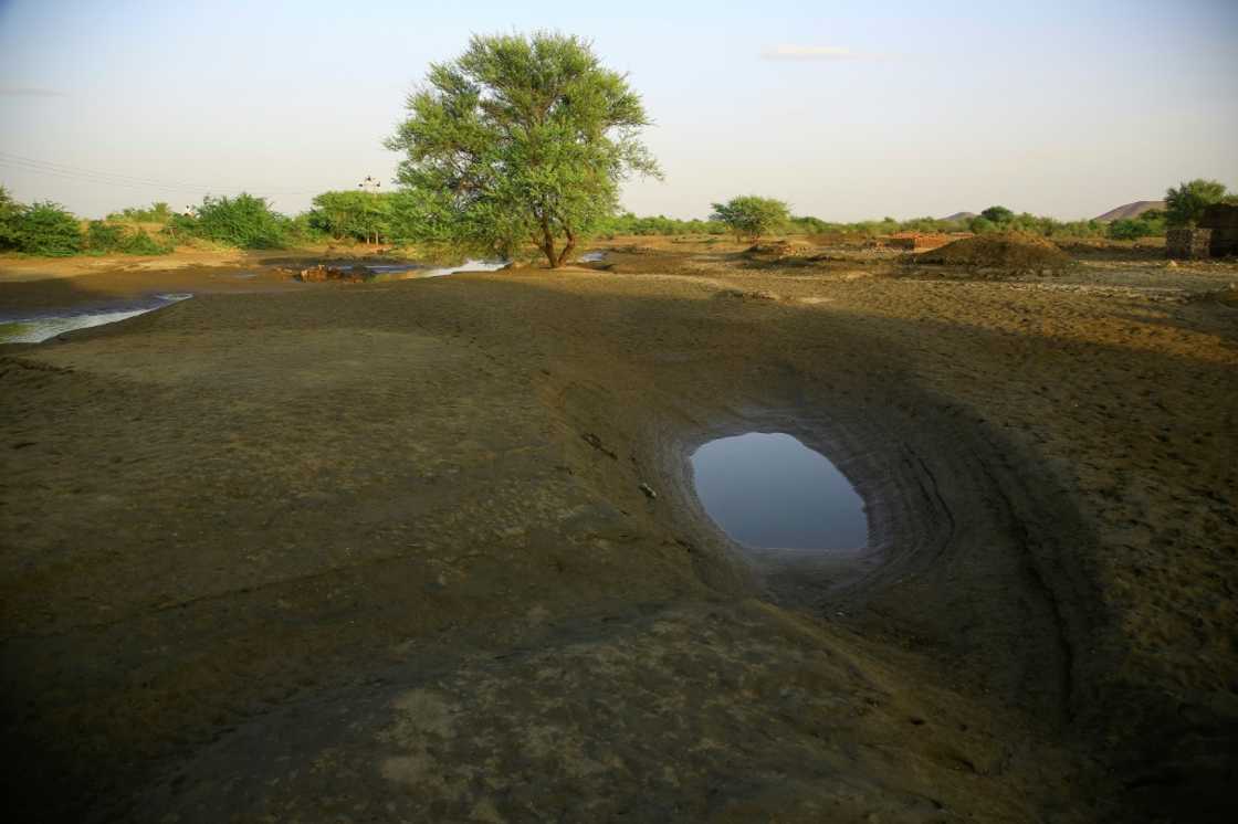 A dried-up canal from the Nile near the Sixth Cataract north of the Sudanese capital Khartoum A dried-up canal from the Nile near the Sixth Cataract north of the Sudanese capital Khartoum