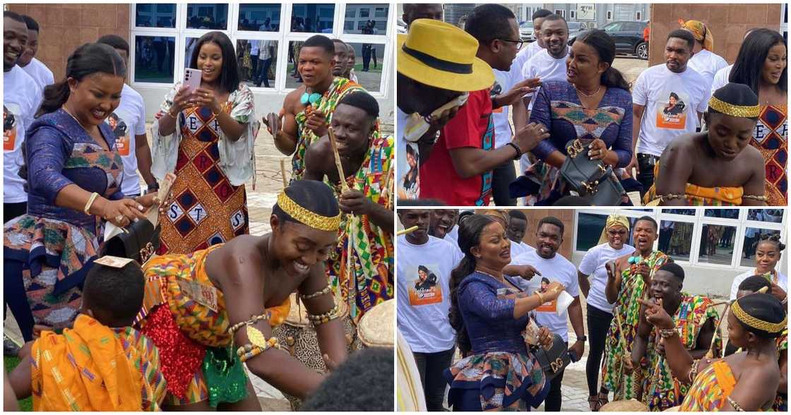 Nana Ama McBrown sprays cash on dancers. Nana Ama McBrown sprays cash on dancers.