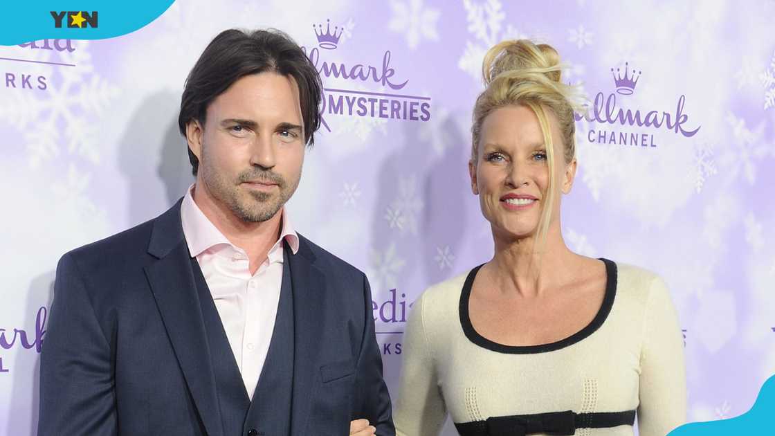 Nicollette Sheridan and Aaron Phypers arrive at a Hallmark Channel event in Pasadena, California. Nicollette Sheridan and Aaron Phypers arrive at a Hallmark Channel event in Pasadena, California.