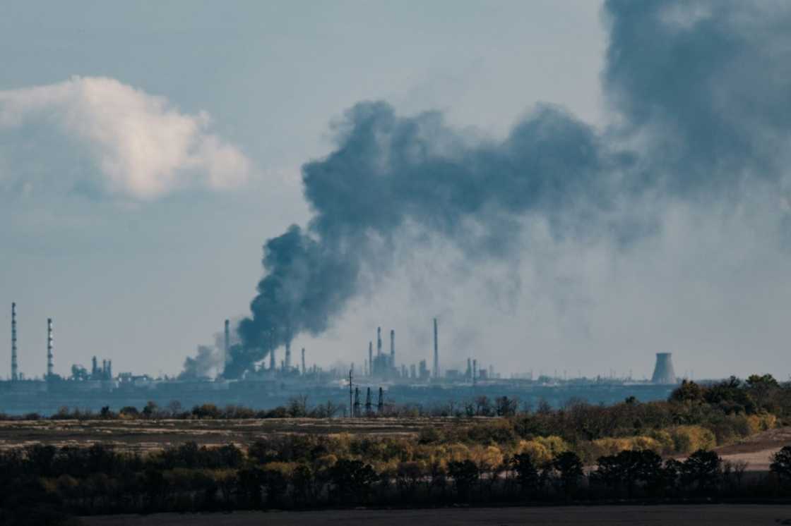 Black smoke rises near Slovianska power station in the Donetsk region on October 13, 2022, amid the Russian invasion of Ukraine Black smoke rises near Slovianska power station in the Donetsk region on October 13, 2022, amid the Russian invasion of Ukraine
