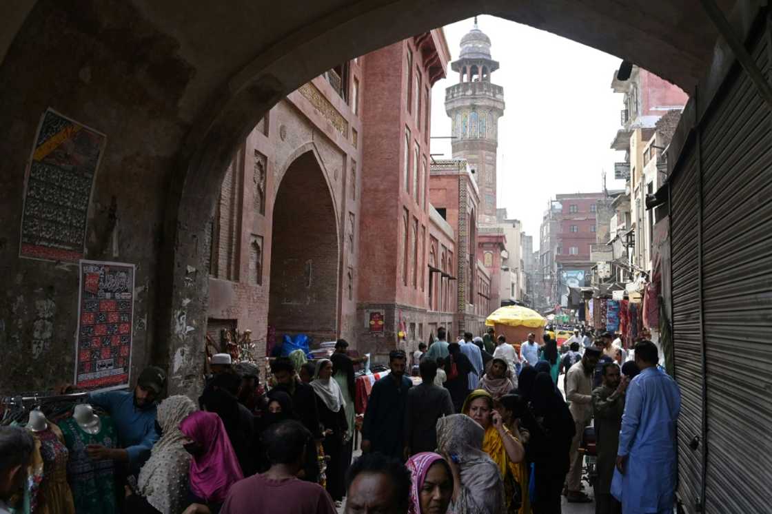 Instead of buying off-the-rack clothes for the girls, Fatima went shopping for fabric in the Old Lahore district and plans to home-stitch their holiday outfits Instead of buying off-the-rack clothes for the girls, Fatima went shopping for fabric in the Old Lahore district and plans to home-stitch their holiday outfits