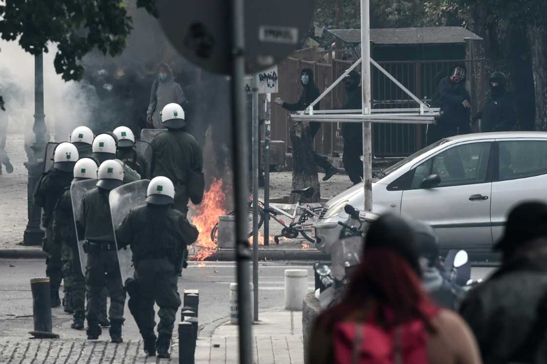 Hooded youths in Athens and Thessaloniki threw firebombs at police Hooded youths in Athens and Thessaloniki threw firebombs at police