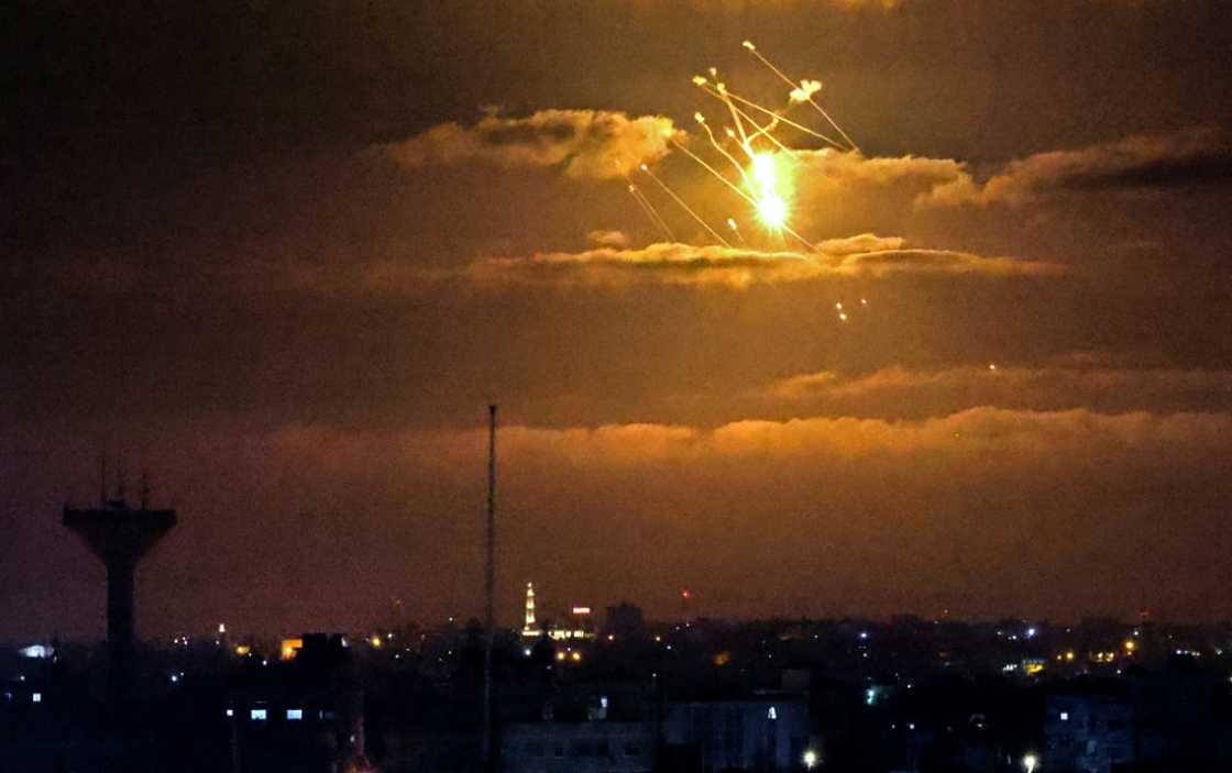 Israel's Iron Dome defence system intercepts incoming missiles fired from the Gaza Strip above the Palestinian enclave, on April 21, 2022. The Iron Dome costs roughly $50,000 per launch Israel's Iron Dome defence system intercepts incoming missiles fired from the Gaza Strip above the Palestinian enclave, on April 21, 2022. The Iron Dome costs roughly $50,000 per launch