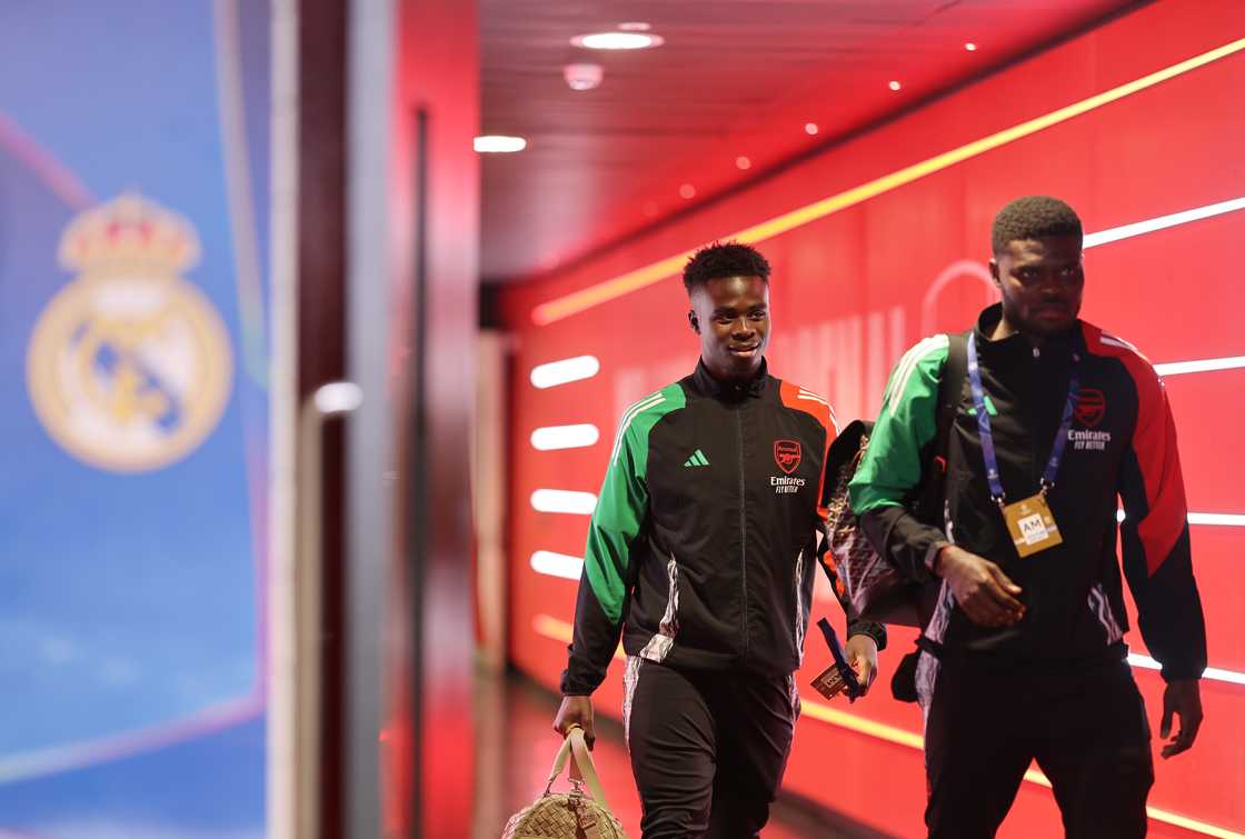 Bukayo Saka (L) and Thomas Partey (R) of Arsenal arrive at the stadium ahead of the Arsenal vs Real Madrid 2024/25 UCL quarter-final match on April 8, 2025 Bukayo Saka (L) and Thomas Partey (R) of Arsenal arrive at the stadium ahead of the Arsenal vs Real Madrid 2024/25 UCL quarter-final match on April 8, 2025